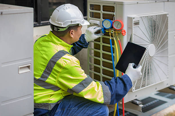 Professional Air Duct Cleaning technician working in Oxford, KS